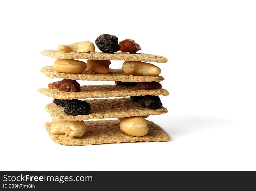 Stack of slices crispbread with nuts