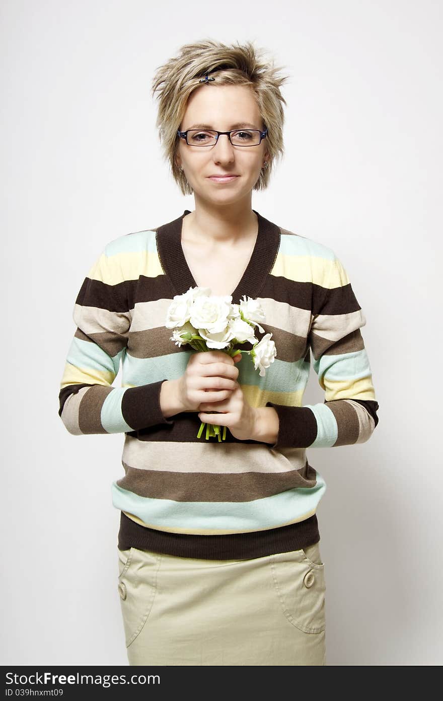 Portrait of attractive woman with flowers