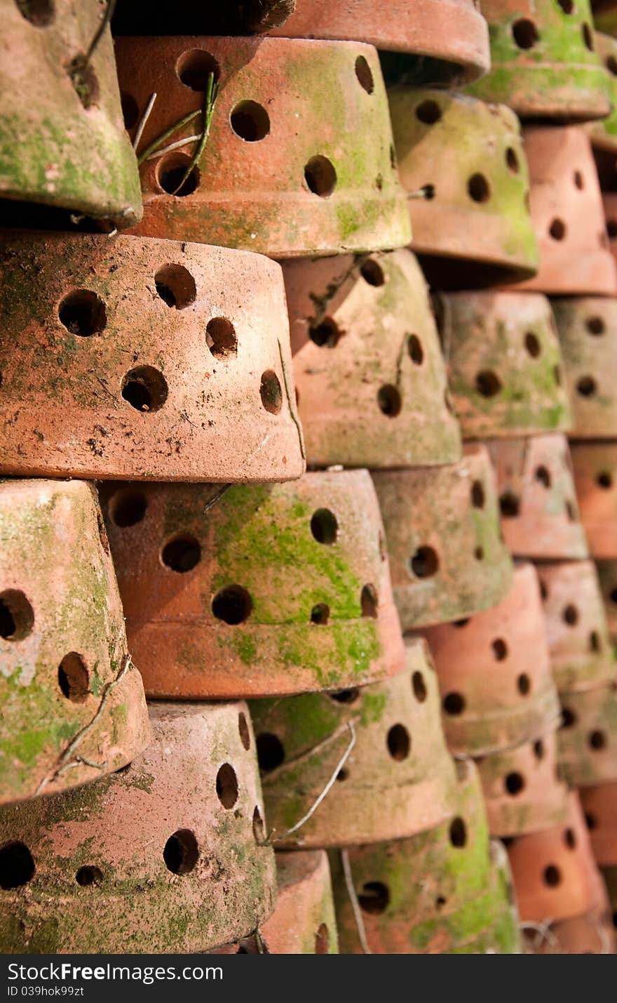 A lot of Clay Pots were stacked. A lot of Clay Pots were stacked.