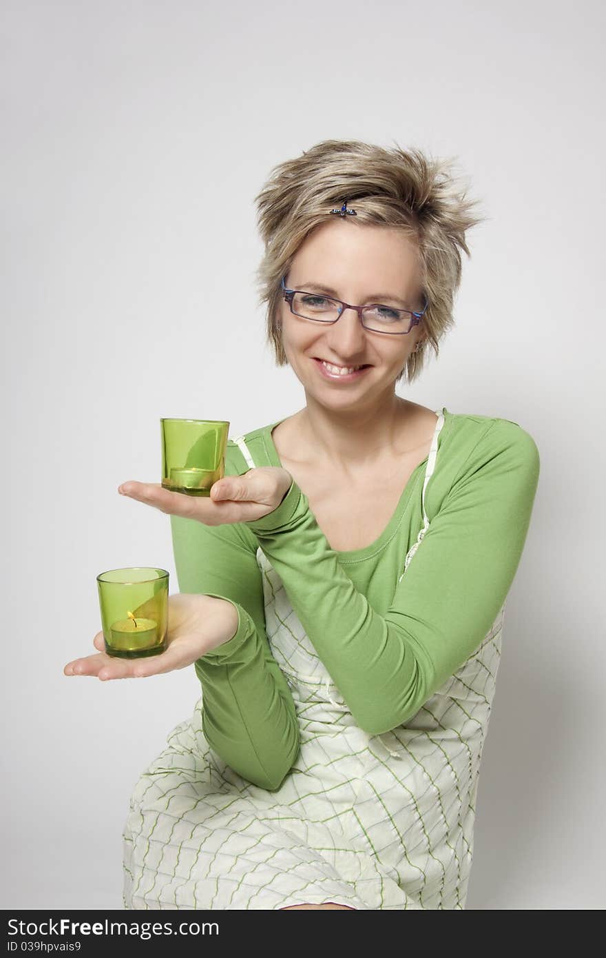 Portrait of attractive woman with candles