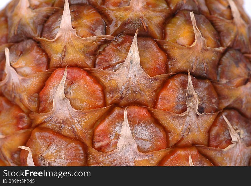 Close up of the of orange pineapple, macro background