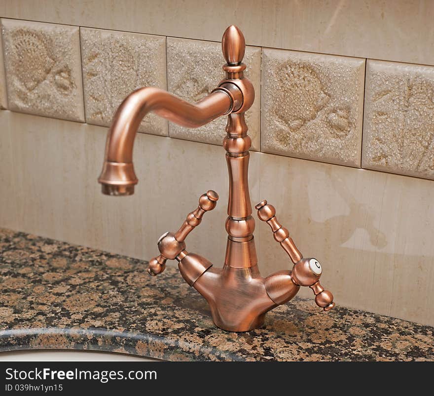 Bathroom tap on a washbasin