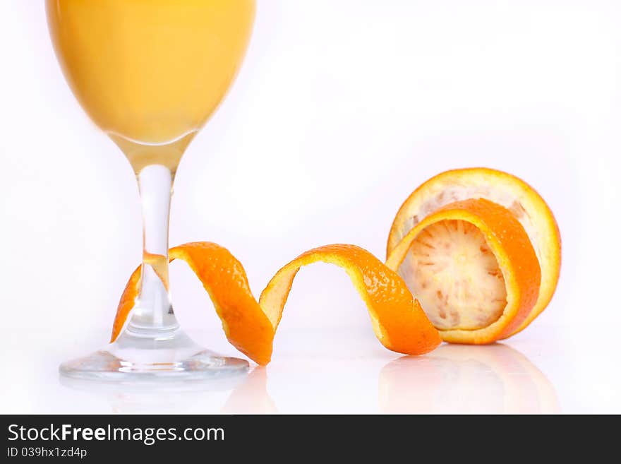 Orange with juice isolated on the white