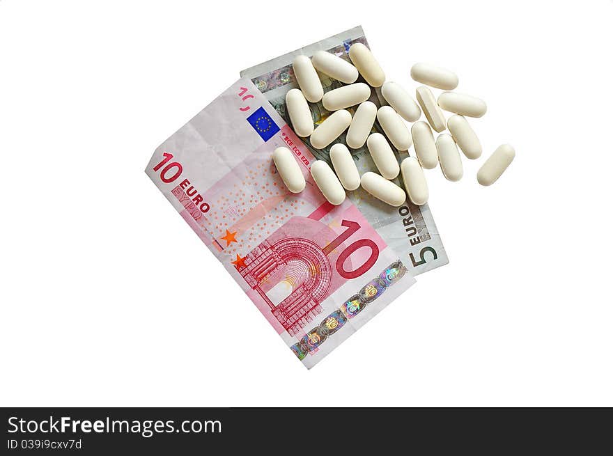 Medical pills and eur money, concept of pharmaceutics or pharmaceutical business. Medical pills and eur money, concept of pharmaceutics or pharmaceutical business.