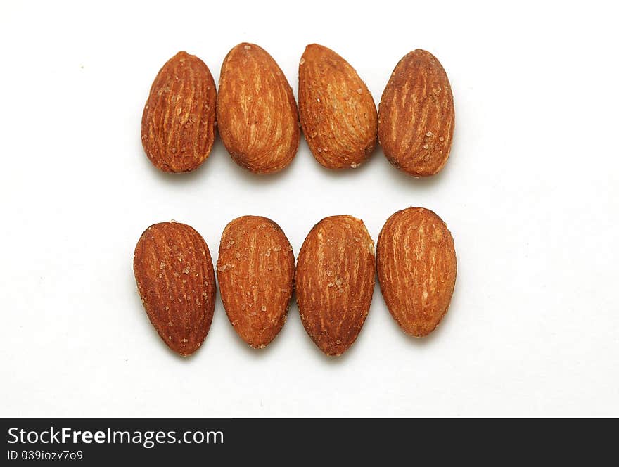 Almond nuts isolated on white