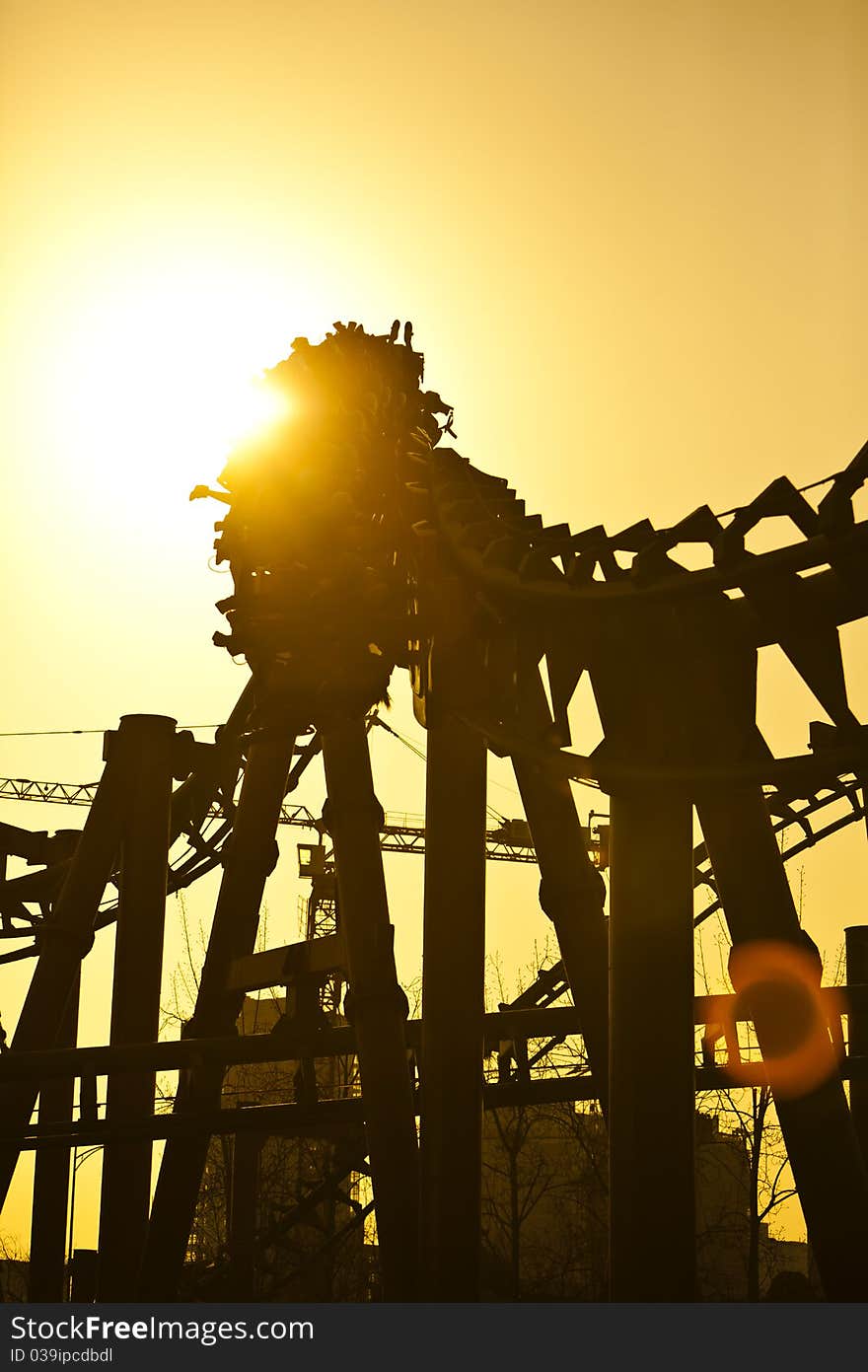 Roller coaster in amusement park.