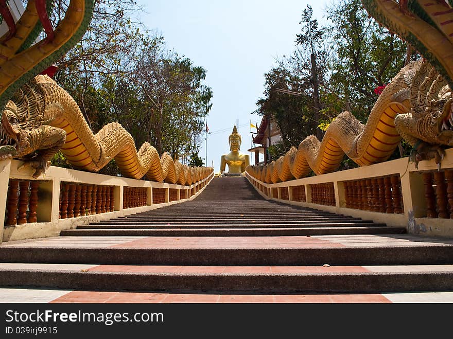 Long stairs to Buddha Statue in Thailand.