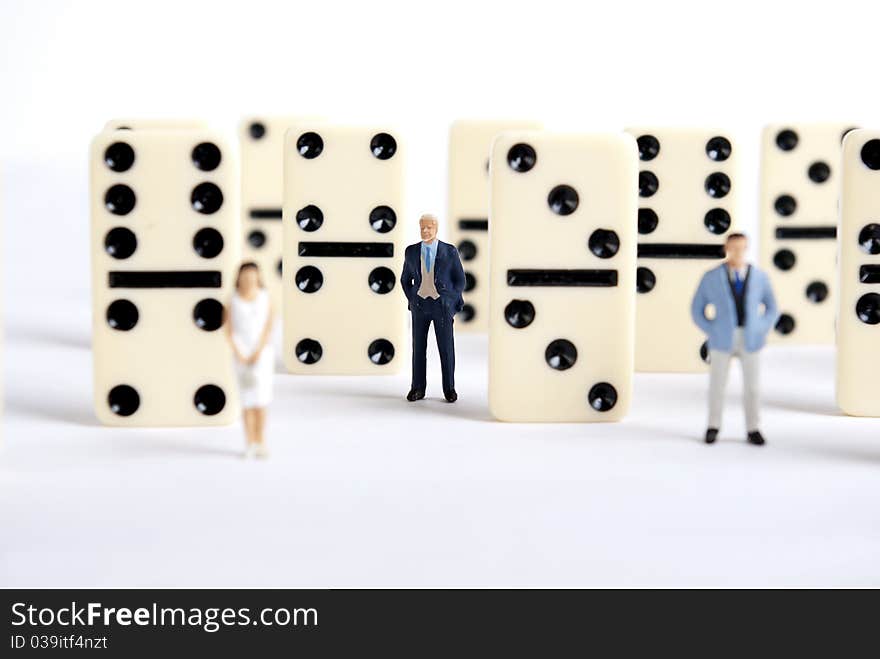 Some miniature people on domino cubes