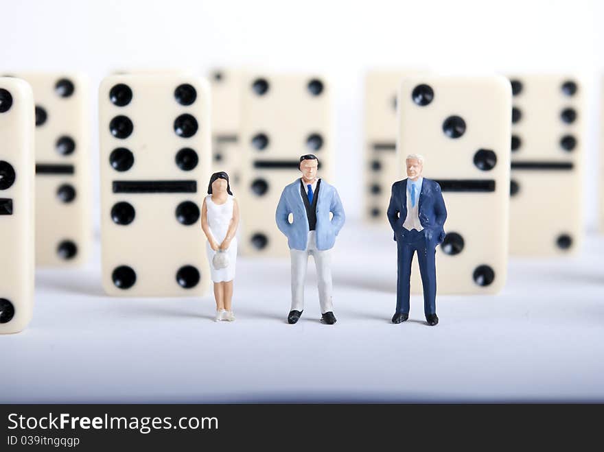 Some miniature people on domino cubes