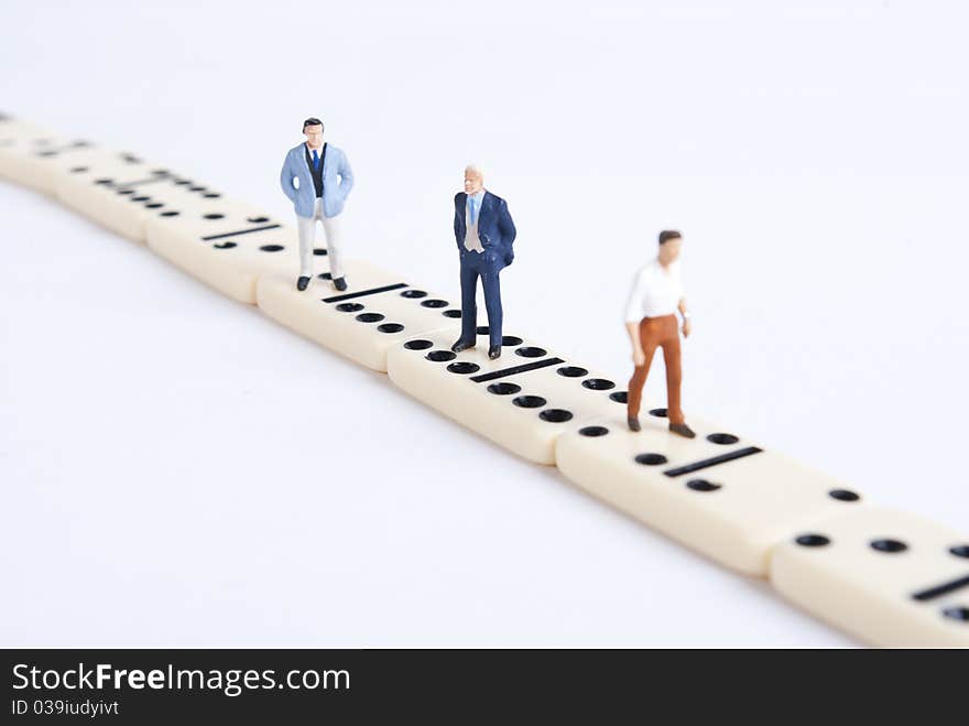 Some miniature people on domino cubes