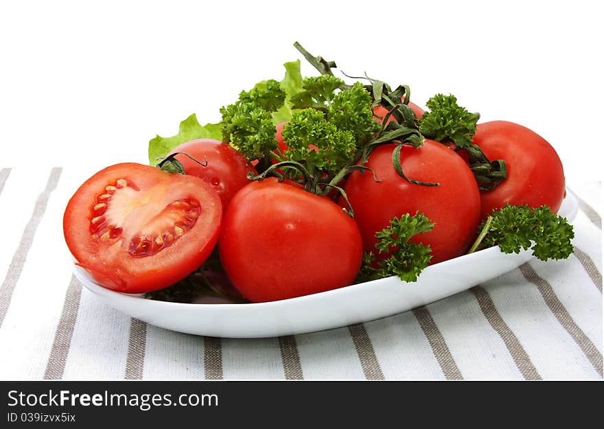 Bunch of tomatoes with parsley