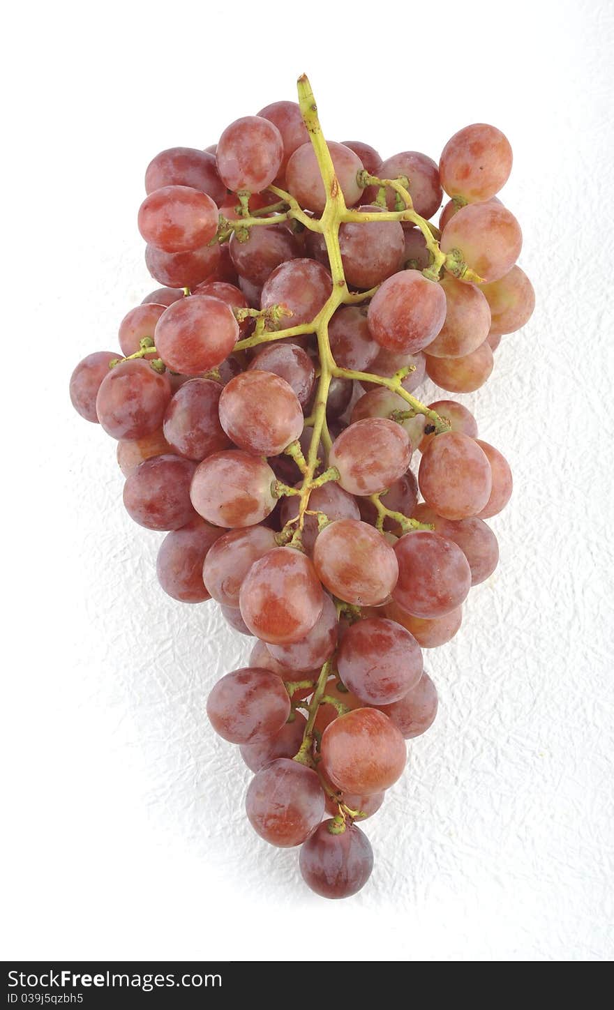 Red grapes isolated on white background