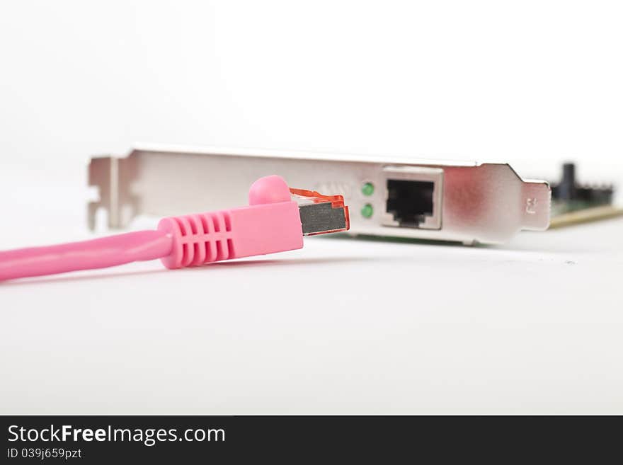 Ethernet card with pink ethernetcable ,connected, concept of networking