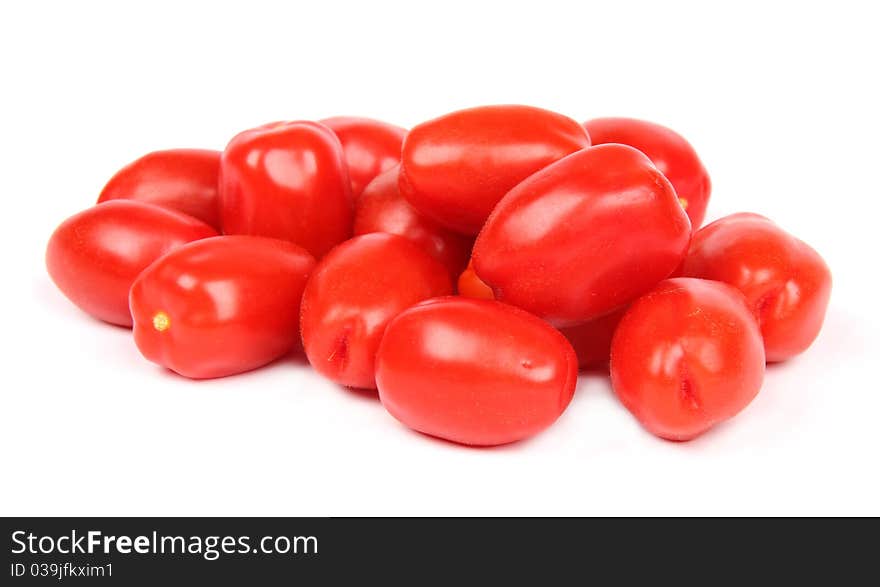 Studio photo of cherry tomatoes, isolated on white background