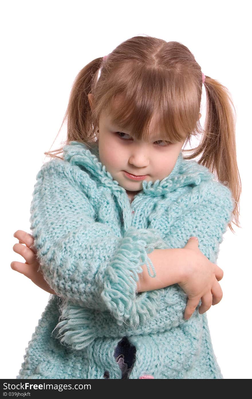 The little girl takes offence isolated on white background