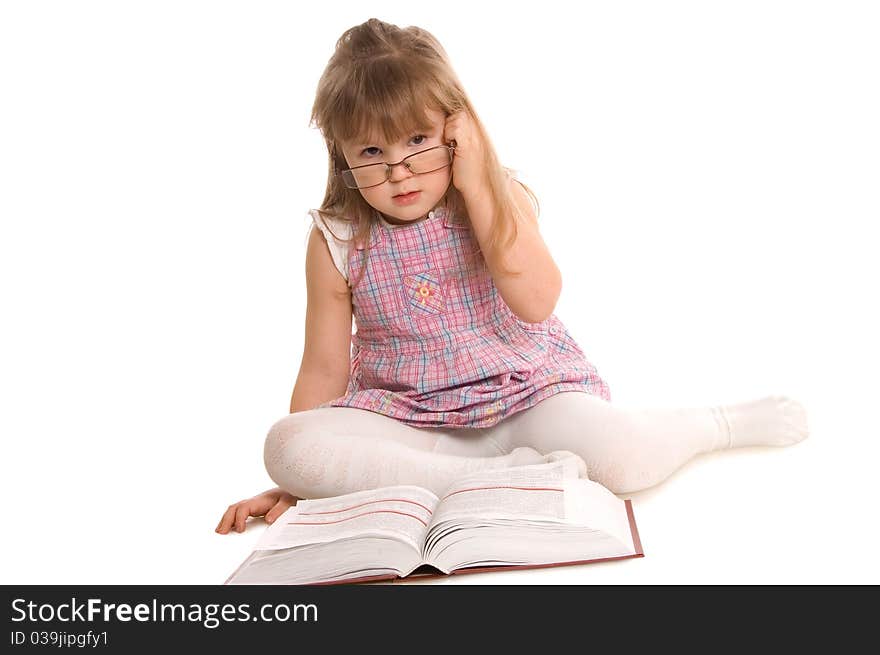 The little girl with the book on white