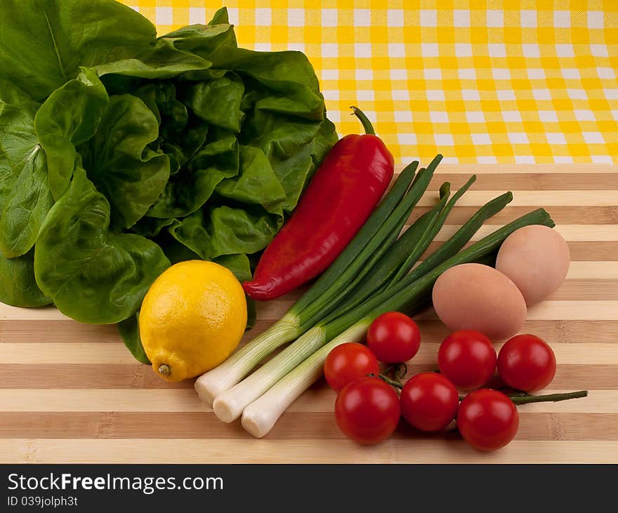 Fresh vegetables on wooden tray