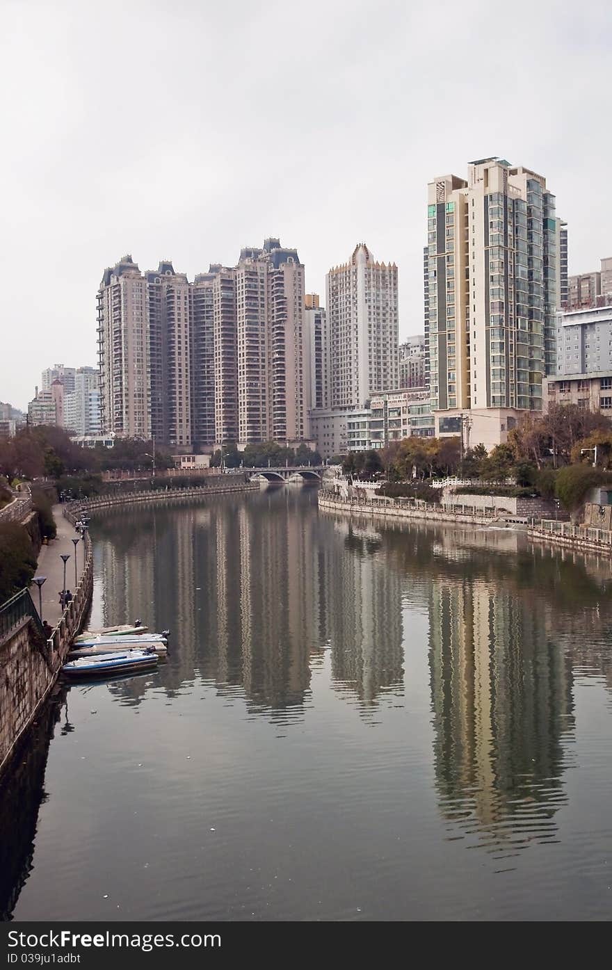 With the development of China, more and more tall buildings were built but the environment comes worse and worse. With the development of China, more and more tall buildings were built but the environment comes worse and worse