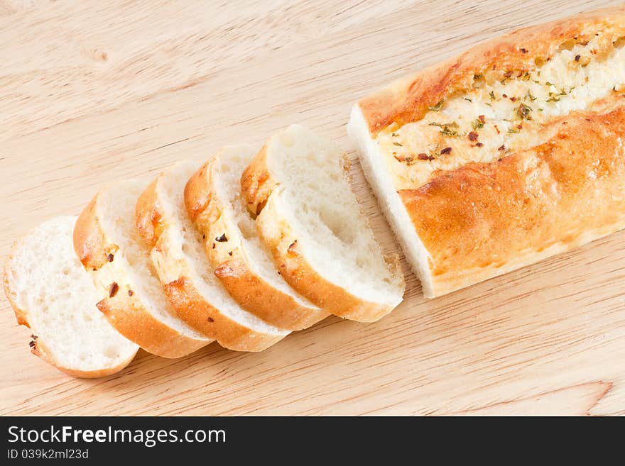 Stack of Garlic bread on wood cut board