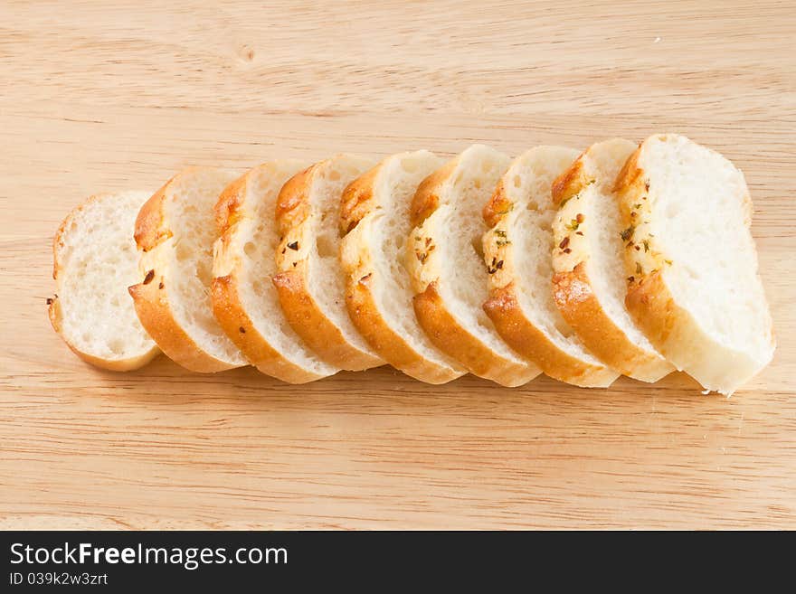 Stack of Garlic bread on wood cut board