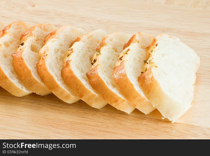 Stack of Garlic bread on wood cut board