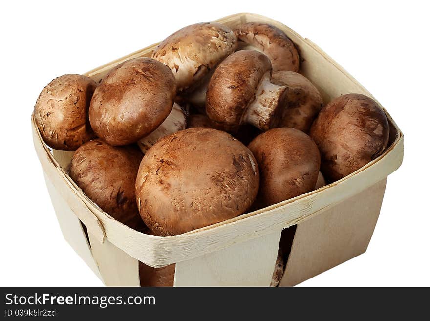 Field mushrooms in a wicker basket