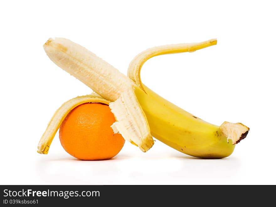 Peeled banana and mandarin orange isolated on a white background