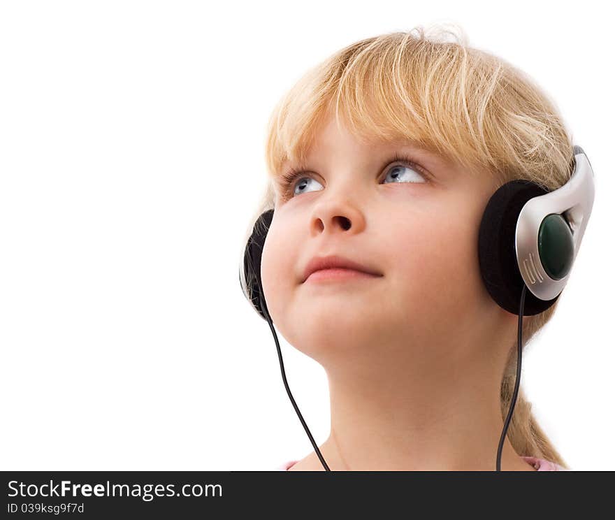 Little girl in headphones, white background