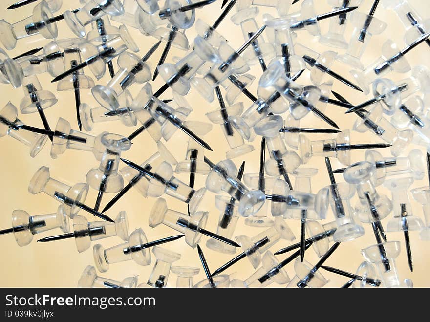 Push pins on a light table