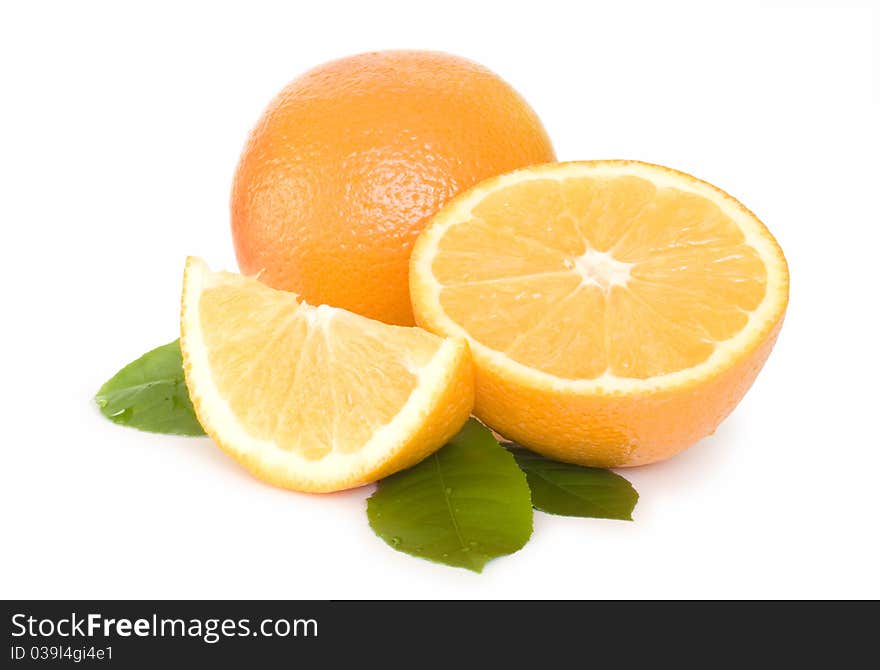 Orange half and slice with leaves