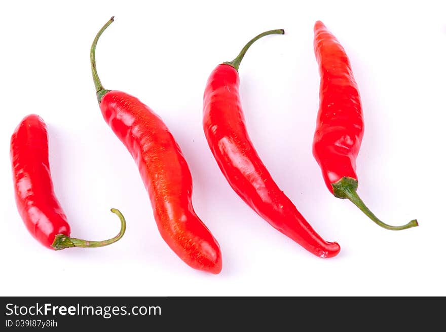 Red chili peppers isolated on white background