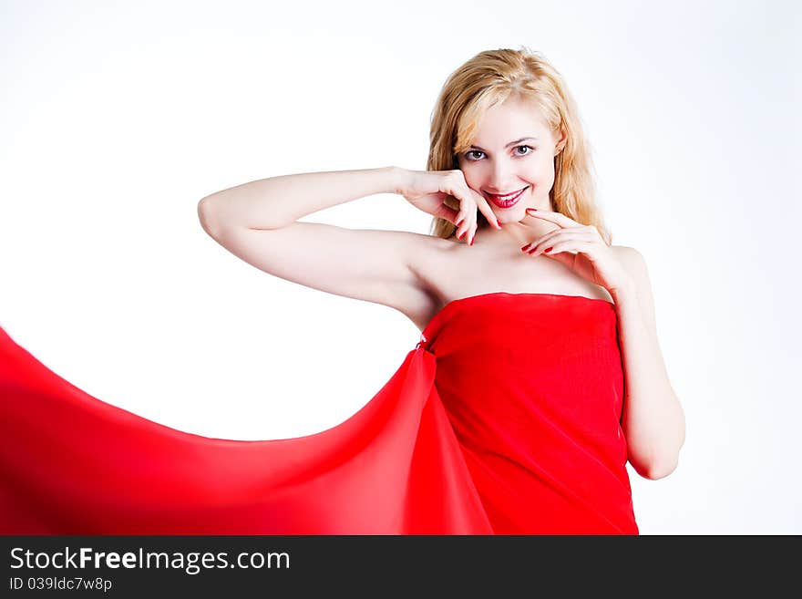 Red, beautiful blonde in a red dress