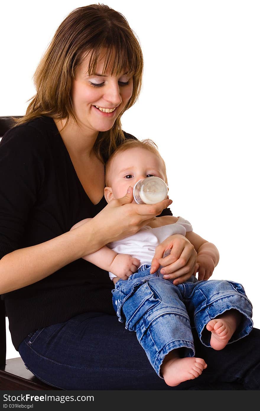 Young mother feeding her baby