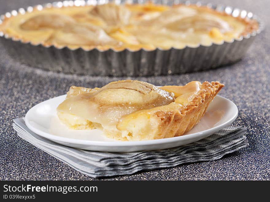 Tart from pears in the baking dish. Tart from pears in the baking dish