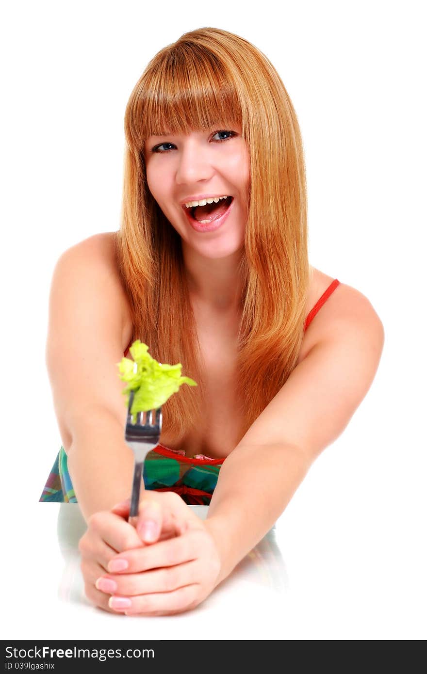 Healthy lifestyle concept. Girl with fork and salad isolated over white.