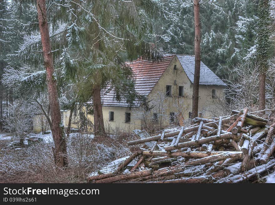 Old house in the middle of the forest