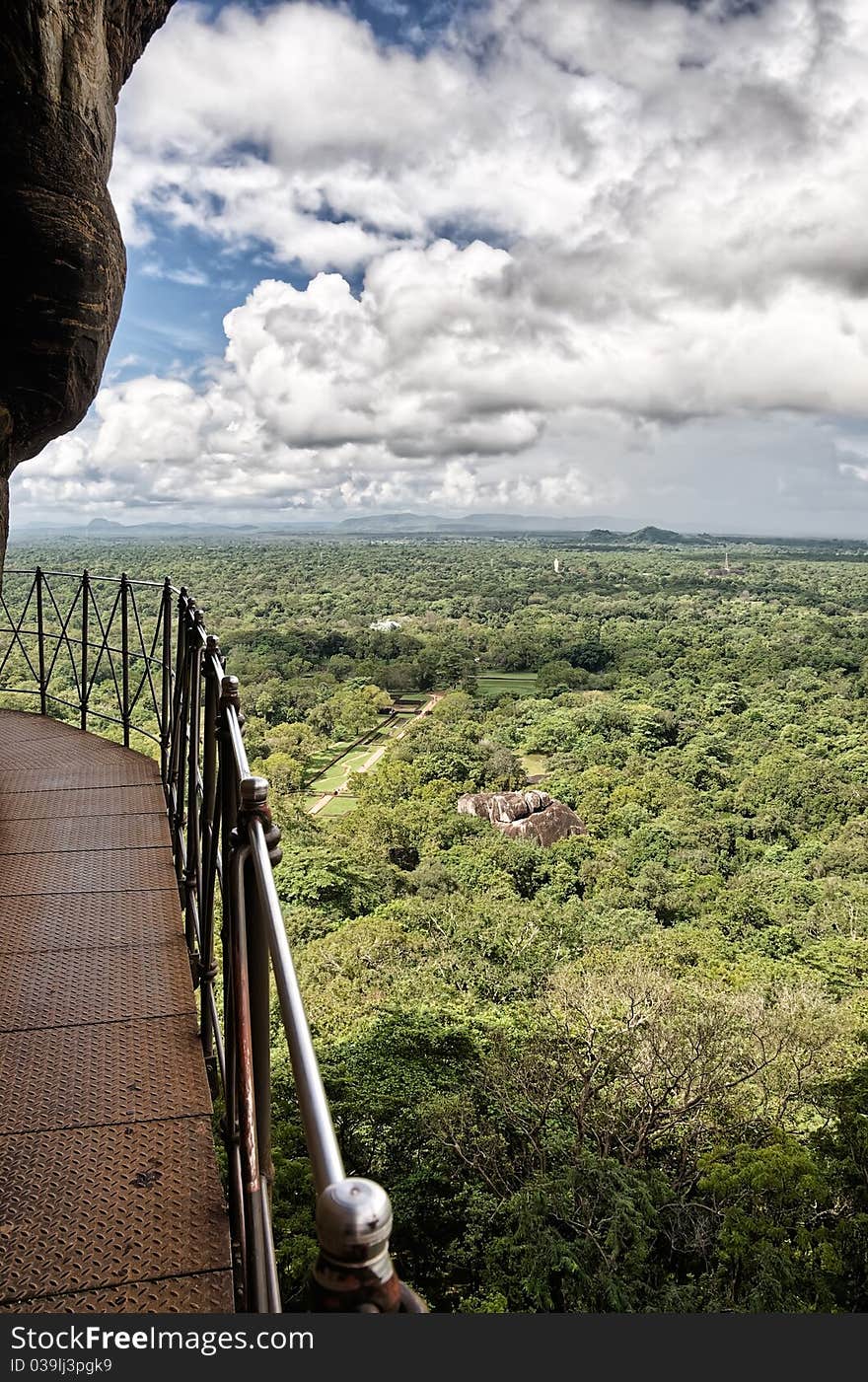 Walkway and view at the rock fortress of Sigiriya in Sri Lanka. Walkway and view at the rock fortress of Sigiriya in Sri Lanka