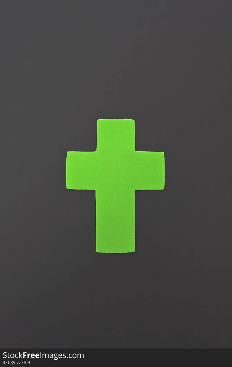 Green Cross isolated on grey