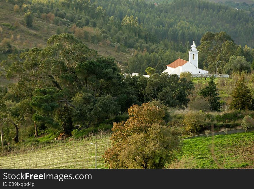 Little white church at Portigal's countryside