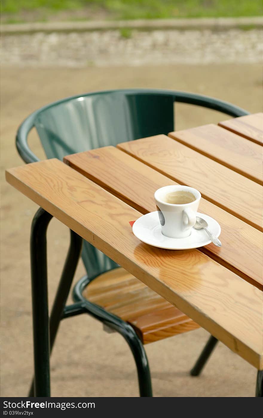 Coffee cup at table at cafe. Coffee cup at table at cafe