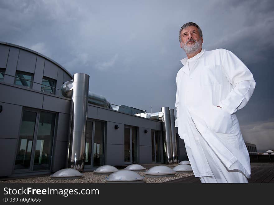 Doctor standing on the roof of the research center