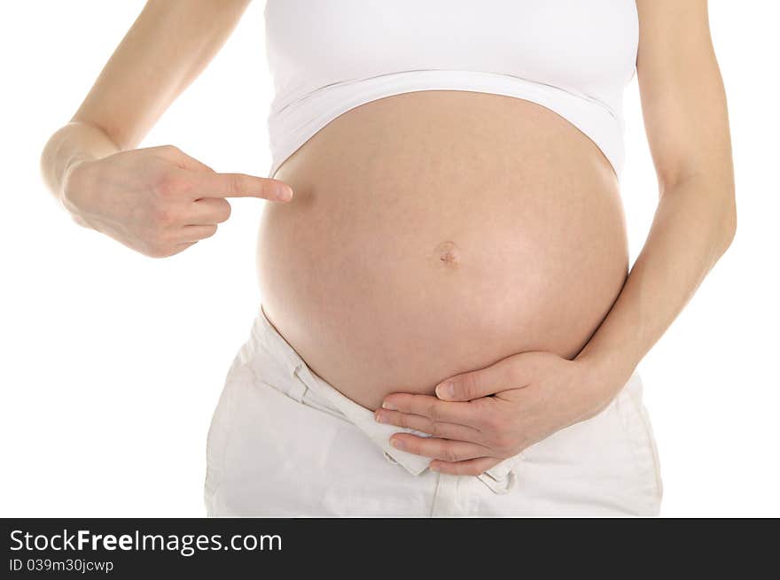 Pregnant woman shows her belly