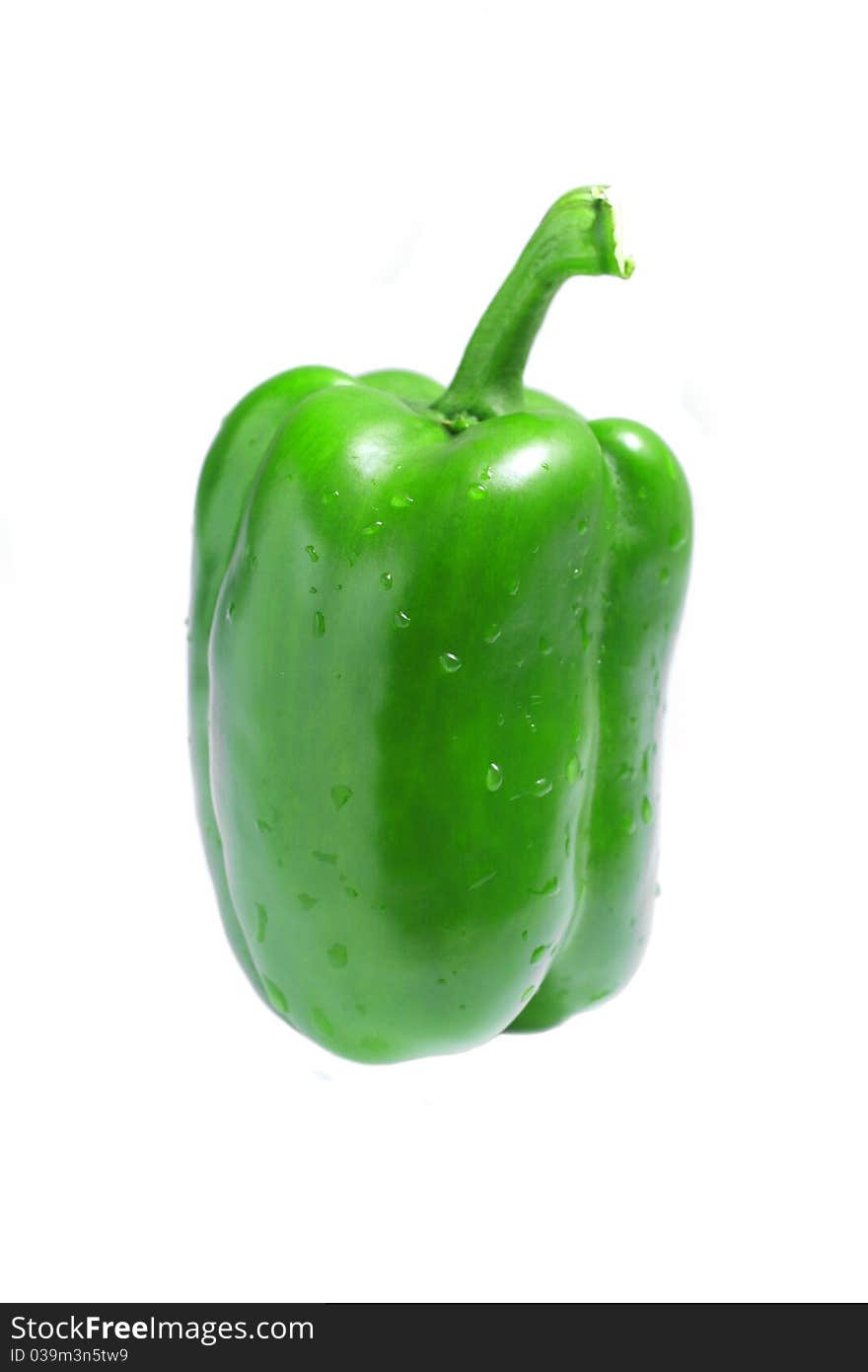 Close up of a green pepper isolated on white background.
