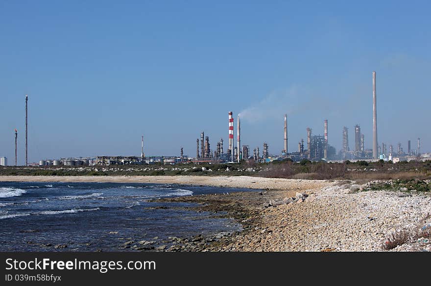 Oil refinery plant by the sea