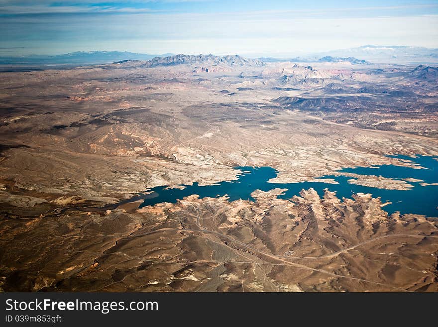 Aerial photograph of lake and rocky desert in western USA. Aerial photograph of lake and rocky desert in western USA