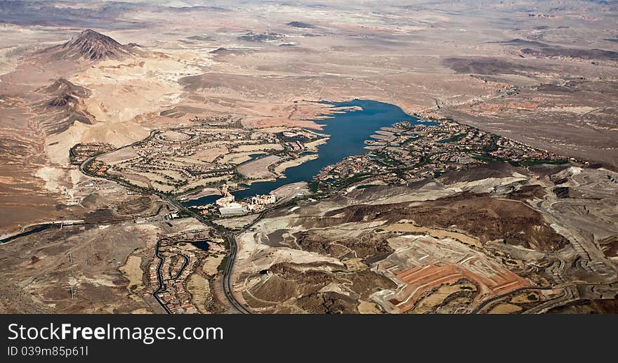 Aerial photograph of lake and rocky desert in western USA. Aerial photograph of lake and rocky desert in western USA