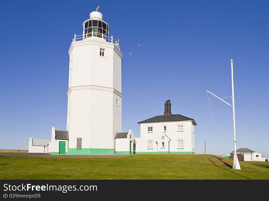 White Light House On A Sunny Day