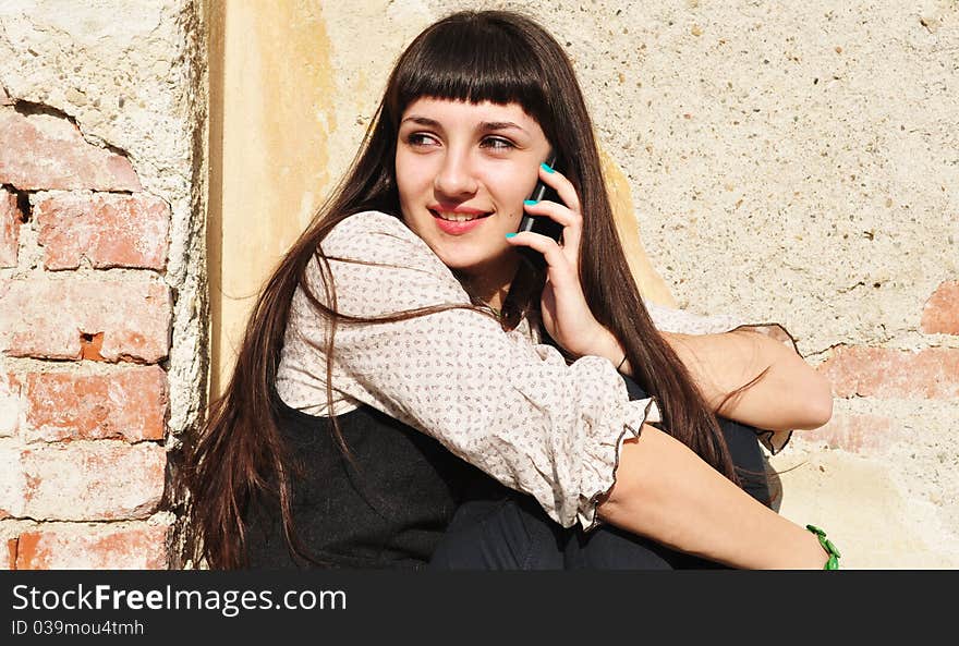 Teenager Girl Outside On The Phone