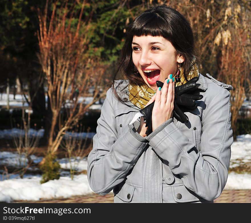 Young joyful woman in the park