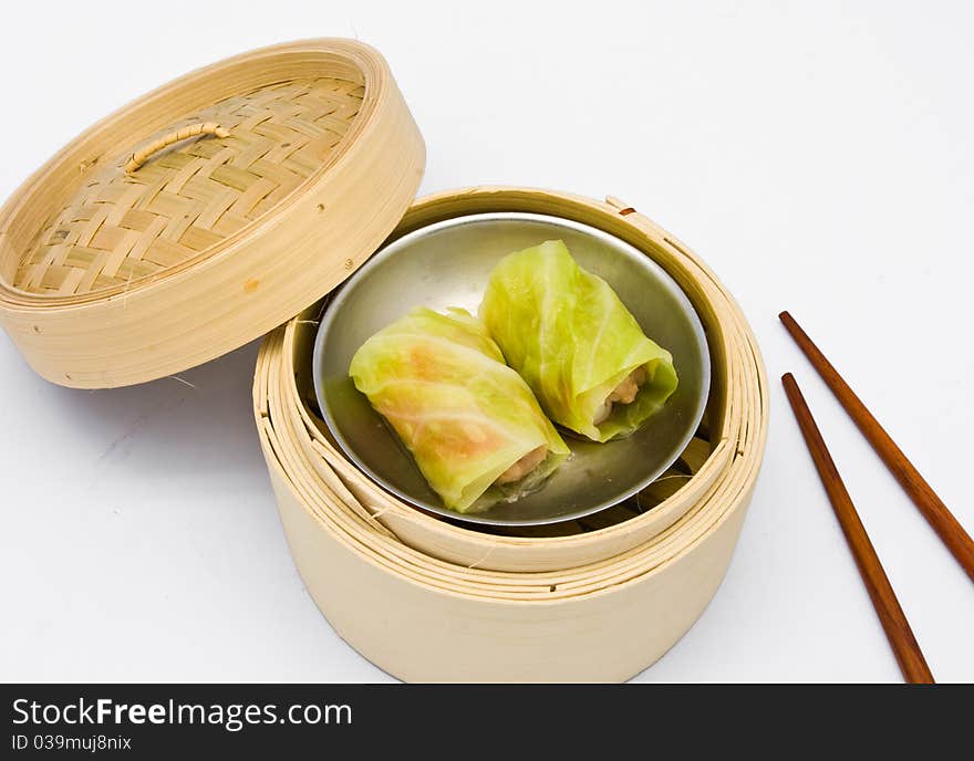Chinese steamed dim sum cabbage in bamboo containers traditional cuisine
